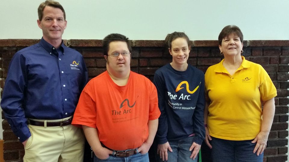 Brian, Josh, Stephanie, and Brenda model some of the apparel items available to order.