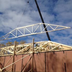 Lifting and installation of trusses continues.