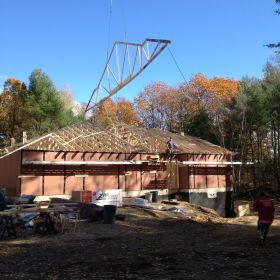 Roof structure nearly complete.