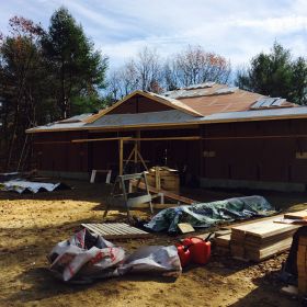 Roof shingles delivered and ready for installation.