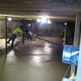 Basement floor being poured.