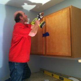 John Smith, Construction Project Manager, puts some final touches on the new group home.