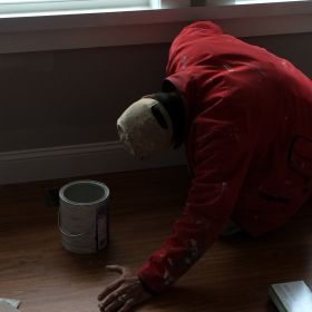 M&N Painting Co. puts the final touches on the trim.