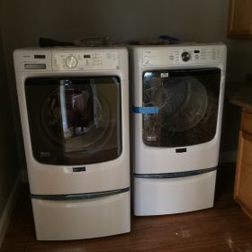 High efficiency washer and dryer located on the ground floor level.