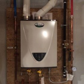 High efficiency water heater with digital water temperature readout.