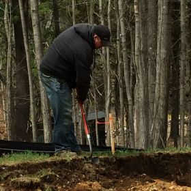 Dan's Paving & Excavating working on site preparation.