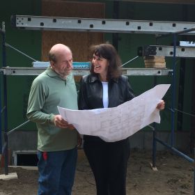 Construction Project Manager, John Smith and Jan from McKenzie Engineering go over the plans at the Auburn home