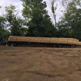 Roof trusses arrive.