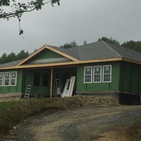 Doors and windows being installed.