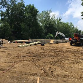 Foundation walls complete and back filled.