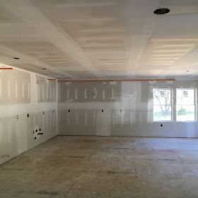 Dry-walled large room.